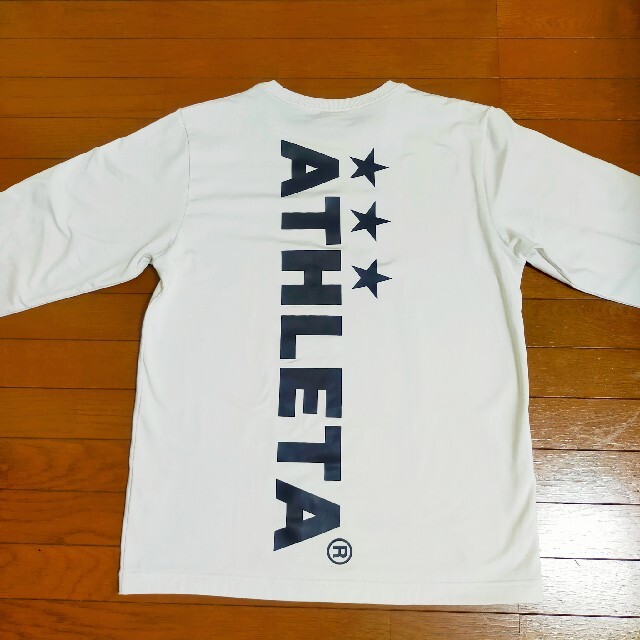 ATHLETA(アスレタ)の送料込み☆中古☆ATHLETA☆アスレタ☆長袖Tシャツ☆M スポーツ/アウトドアのサッカー/フットサル(ウェア)の商品写真