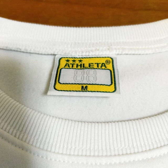 ATHLETA(アスレタ)の送料込み☆中古☆ATHLETA☆アスレタ☆長袖Tシャツ☆M スポーツ/アウトドアのサッカー/フットサル(ウェア)の商品写真