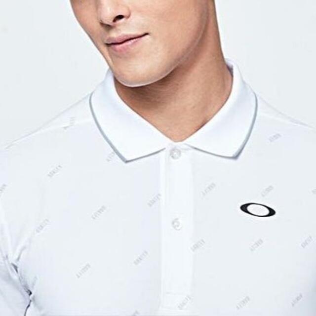 Oakley(オークリー)の(新品)OAKLEY　ロゴ総柄　ポロシャツ メンズのトップス(ポロシャツ)の商品写真