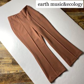 アースミュージックアンドエコロジー(earth music & ecology)のアースミュージックアンドエコロジー センタープレスフレアパンツ古着ピンク (カジュアルパンツ)