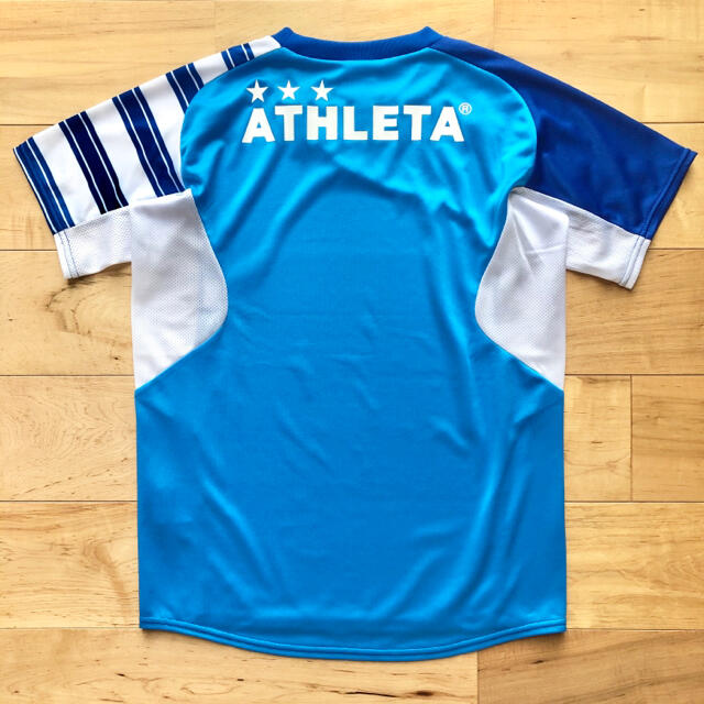 ATHLETA(アスレタ)のATHLETA アスレタジュニア半袖プラクティス上下セット新品150サイズ スポーツ/アウトドアのサッカー/フットサル(ウェア)の商品写真