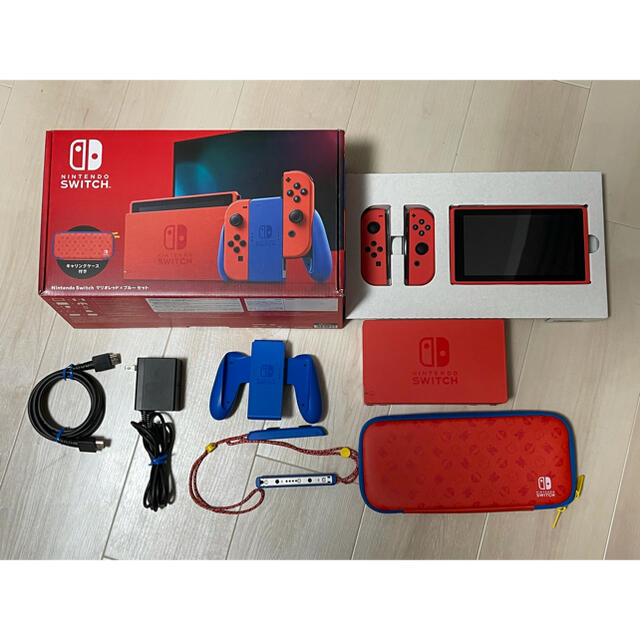 Nintendo Switch(ニンテンドースイッチ)の中古Nintendo Switch マリオ レッド×ブルー セット エンタメ/ホビーのゲームソフト/ゲーム機本体(家庭用ゲーム機本体)の商品写真