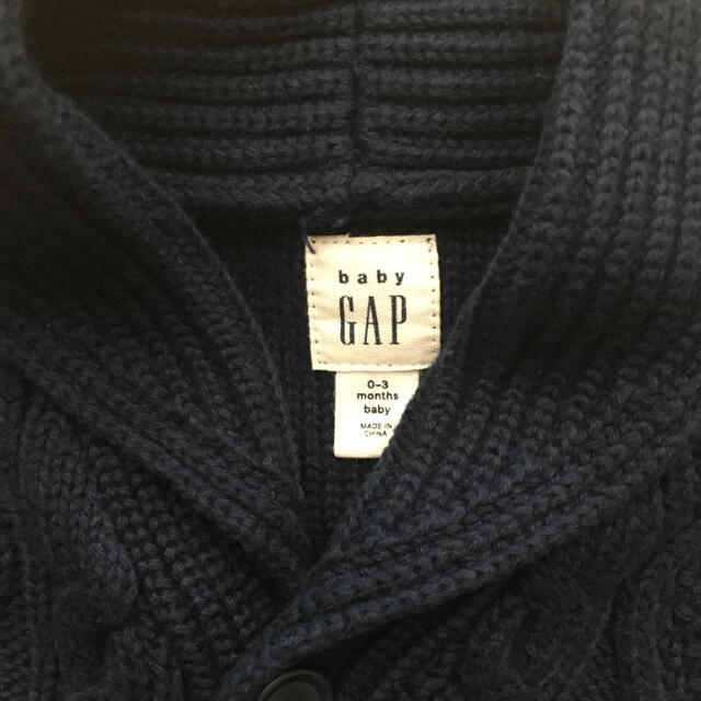 babyGAP(ベビーギャップ)のGAP ネイビーのニットカーディガン キッズ/ベビー/マタニティのベビー服(~85cm)(カーディガン/ボレロ)の商品写真