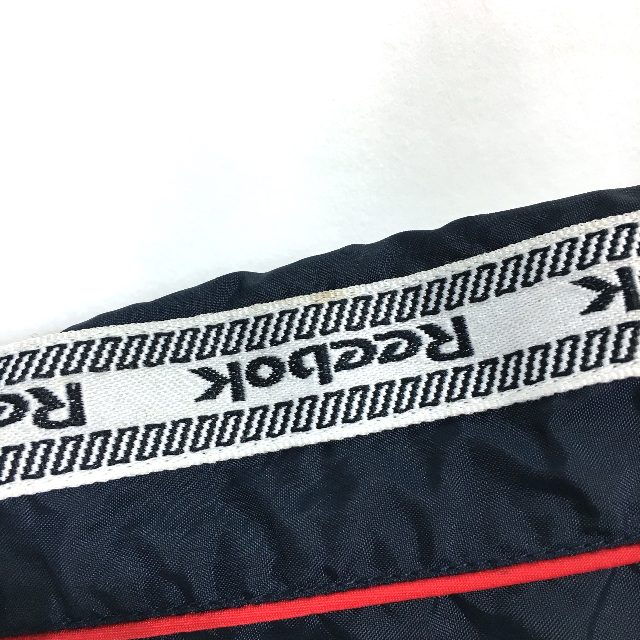 Reebok(リーボック)の〇。リーボック　ナイロンジャケット　XL　ネイビー　ロゴ刺繍　K12。〇 メンズのジャケット/アウター(ナイロンジャケット)の商品写真