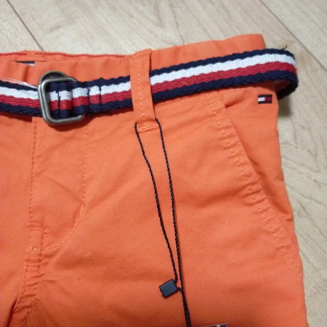 TOMMY HILFIGER(トミーヒルフィガー)のトミーフィルガー ハーフパンツ 110 キッズ オレンジ 新品未使用 ベルト付き キッズ/ベビー/マタニティのキッズ服男の子用(90cm~)(パンツ/スパッツ)の商品写真