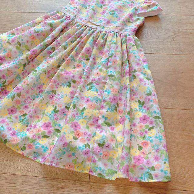 TOCCA(トッカ)の新品　トッカ　ワンピース　花柄　リボン　可愛い　120-130 キッズ/ベビー/マタニティのキッズ服女の子用(90cm~)(ワンピース)の商品写真