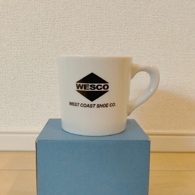 Wesco(ウエスコ)の【希少】WESCO 100周年記念80sロゴ入りマグカップ【限定品】 インテリア/住まい/日用品のキッチン/食器(グラス/カップ)の商品写真