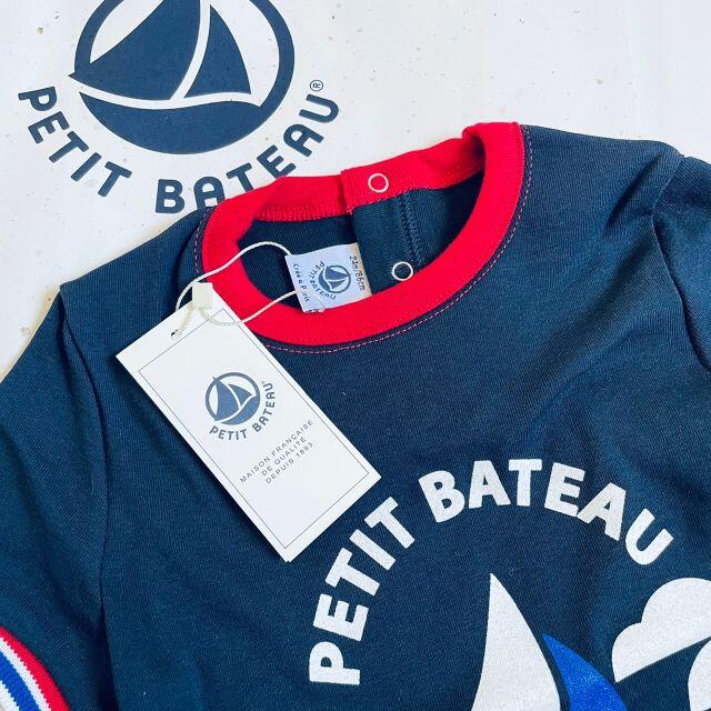 PETIT BATEAU(プチバトー)の新品未使用　プチバトー　24m プリント半袖Ｔシャツ ネイビー　ロゴとトリコ キッズ/ベビー/マタニティのベビー服(~85cm)(Ｔシャツ)の商品写真