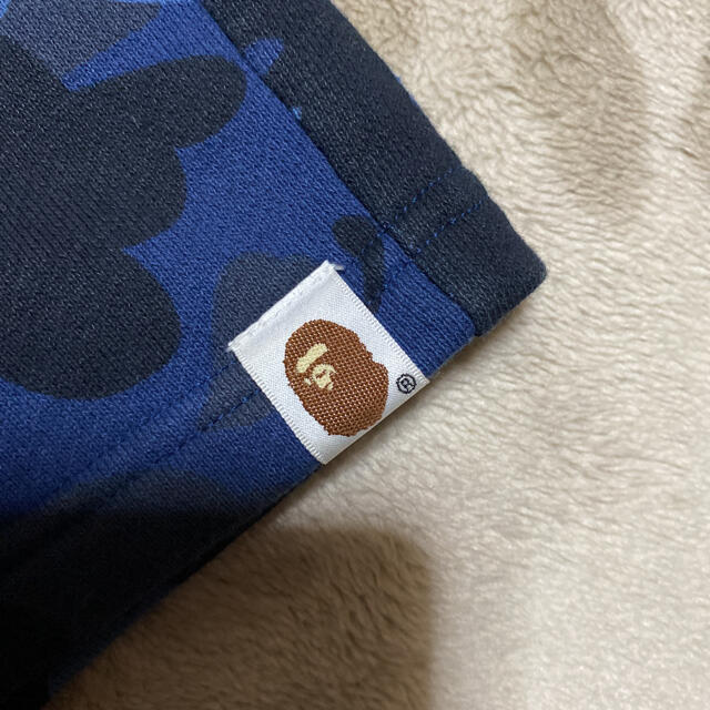 A BATHING APE(アベイシングエイプ)のAPE BAPE CAMO KAWS logo ショーツ　ハーフパンツ　m 迷彩 メンズのパンツ(ショートパンツ)の商品写真