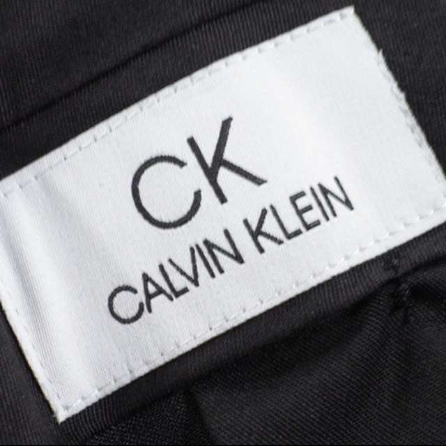 ck Calvin Klein(シーケーカルバンクライン)の新品タグ付き［カルバンクライン］ウールサイドラインパンツ 32 ブラック  メンズのパンツ(スラックス)の商品写真