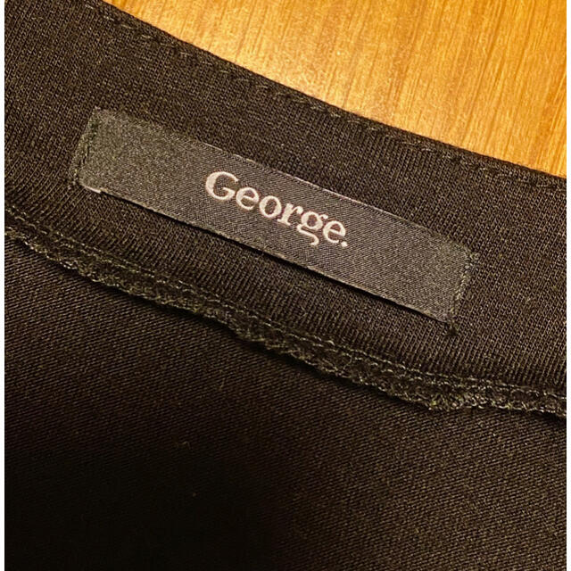 GEORGE COX(ジョージコックス)のGeorge.  トップス　半袖　アシンメトリー　カットソー　胸元リボン　黒 レディースのトップス(カットソー(半袖/袖なし))の商品写真