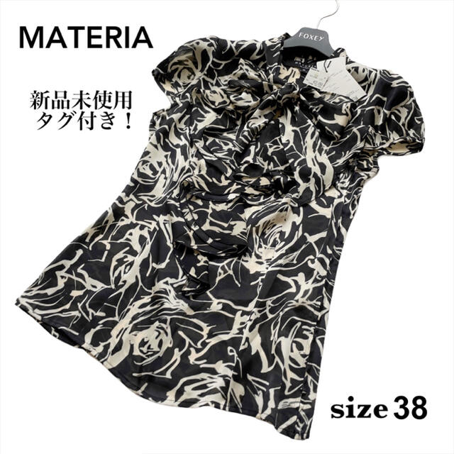 MATERIA(マテリア)の新品未使用 マテリア MATERIA フレンチ袖 ブラウス ボウタイ 花柄 総柄 レディースのトップス(シャツ/ブラウス(半袖/袖なし))の商品写真