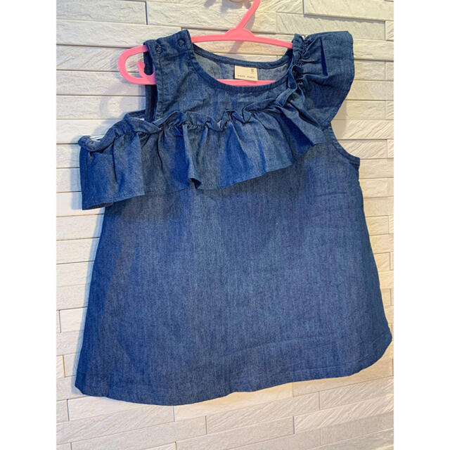 petit main(プティマイン)のpetit main アシメトリーデニムノースリーブトップス　size100 キッズ/ベビー/マタニティのキッズ服女の子用(90cm~)(Tシャツ/カットソー)の商品写真