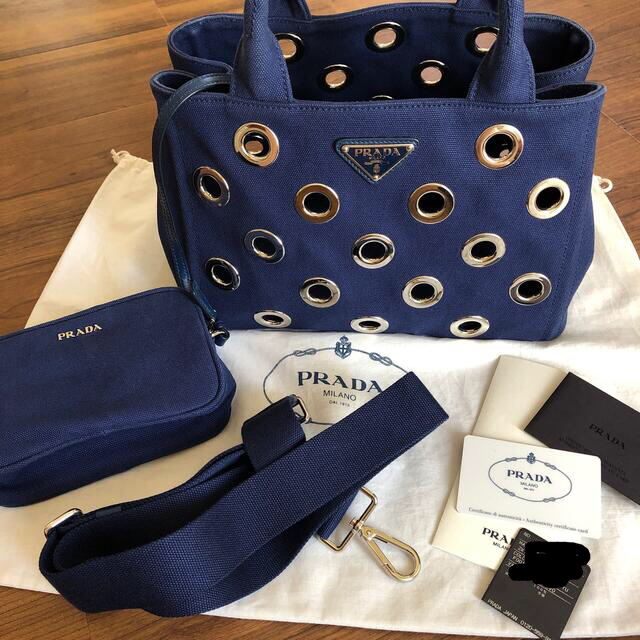 PRADA - 全体的に美品です！ ＰＲＡＤＡ カナパ グロメット ブルーの ...