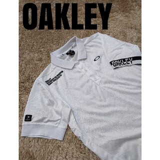 オークリー(Oakley)のろい様専用　オークリー　ポロシャツ　OAKLEY　ドクロ　白　美品(ポロシャツ)