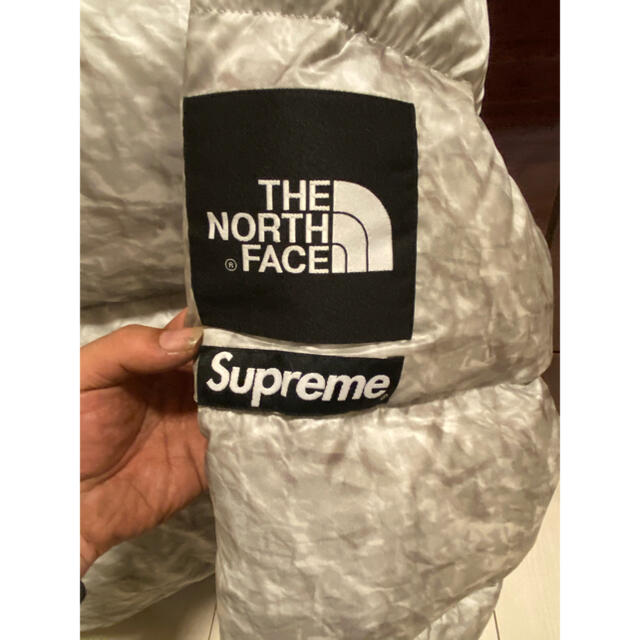 Supreme(シュプリーム)のsupreme the north face 紙ヌプシ メンズのジャケット/アウター(ダウンジャケット)の商品写真