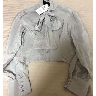 ザラ(ZARA)の新品 ZARA  リボン オーガンザトップス (シャツ/ブラウス(長袖/七分))