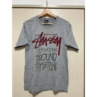 ステューシー(STUSSY)のステューシーのグレー　tシャツ(Tシャツ(半袖/袖なし))