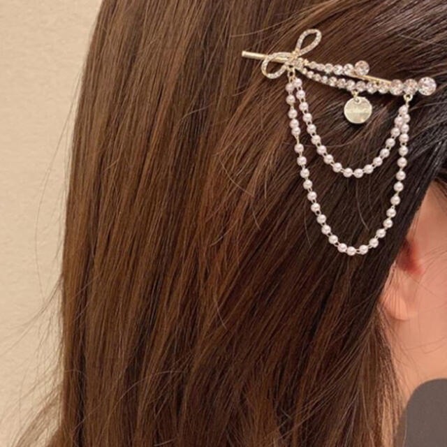 新品未使用☆ヘアピン☆パールリボン レディースのヘアアクセサリー(ヘアピン)の商品写真