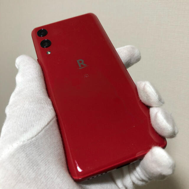Rakuten(ラクテン)のRakuten hand 赤　SIMフリー(再出品) スマホ/家電/カメラのスマートフォン/携帯電話(スマートフォン本体)の商品写真