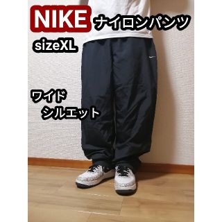 ナイキ(NIKE)のNIKE ナイキ ナイロンパンツ ワイドパンツ ブラック 黒 バギーパンツ XL(ペインターパンツ)