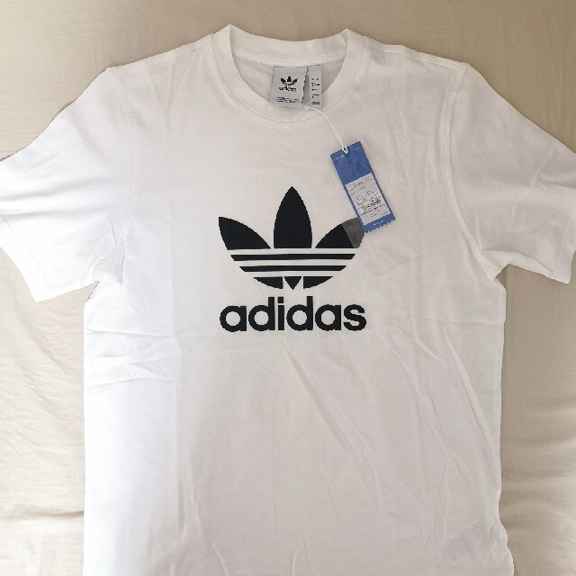 adidas(アディダス)の新品 adidas tシャツ ホワイト アディダス tee メンズのトップス(Tシャツ/カットソー(半袖/袖なし))の商品写真