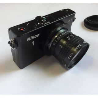 ニコン(Nikon)のNikon1 J4 BLACK+Pentax Cosmicar 業務用レンズ付き(ミラーレス一眼)