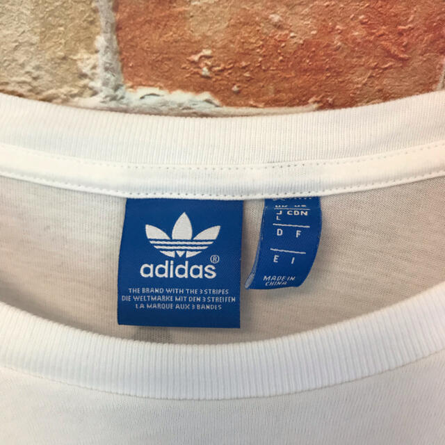 adidas(アディダス)のアディダスオリジナルス　adidas 半袖tシャツ Tシャツ　野球女子　L 白 メンズのトップス(Tシャツ/カットソー(半袖/袖なし))の商品写真