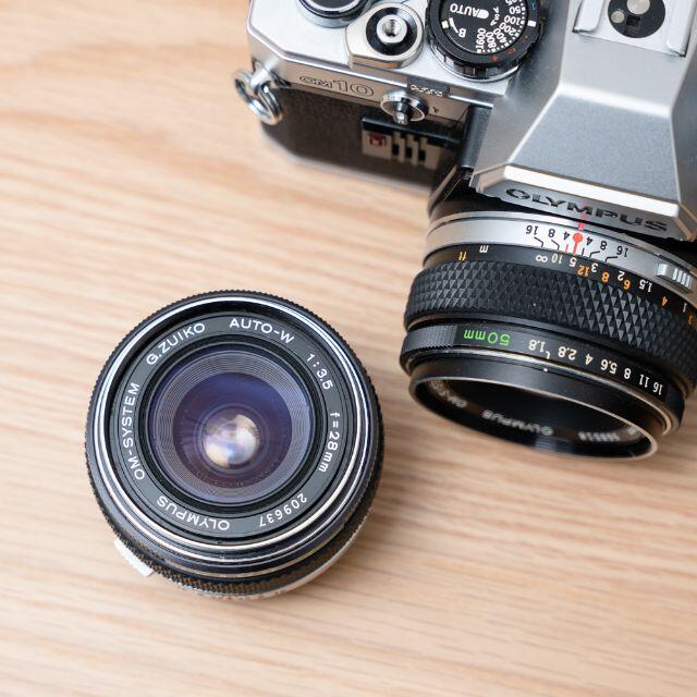 OLYMPUS(オリンパス)のOLYMPUS オリンパス OM10 レンズ3本/28mm 50mm 135mm スマホ/家電/カメラのカメラ(フィルムカメラ)の商品写真