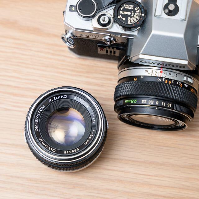 OLYMPUS(オリンパス)のOLYMPUS オリンパス OM10 レンズ3本/28mm 50mm 135mm スマホ/家電/カメラのカメラ(フィルムカメラ)の商品写真