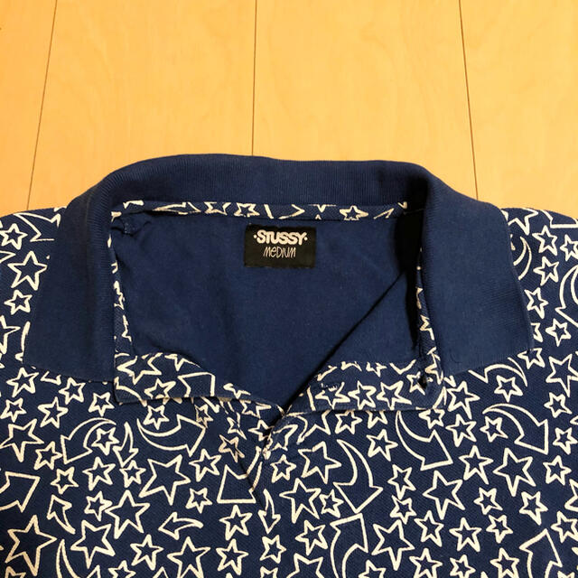 STUSSY(ステューシー)の【値下げ】STUSSY ステューシー　総柄星柄Tシャツ　ブルー　ポロシャツ メンズのトップス(ポロシャツ)の商品写真