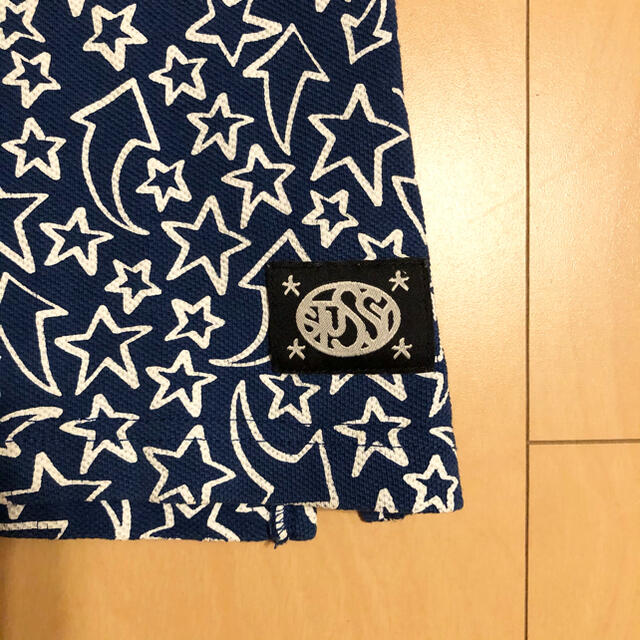 STUSSY(ステューシー)の【値下げ】STUSSY ステューシー　総柄星柄Tシャツ　ブルー　ポロシャツ メンズのトップス(ポロシャツ)の商品写真