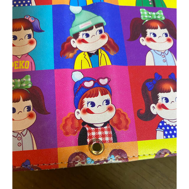 ペコちゃんスマホケース エンタメ/ホビーのおもちゃ/ぬいぐるみ(キャラクターグッズ)の商品写真