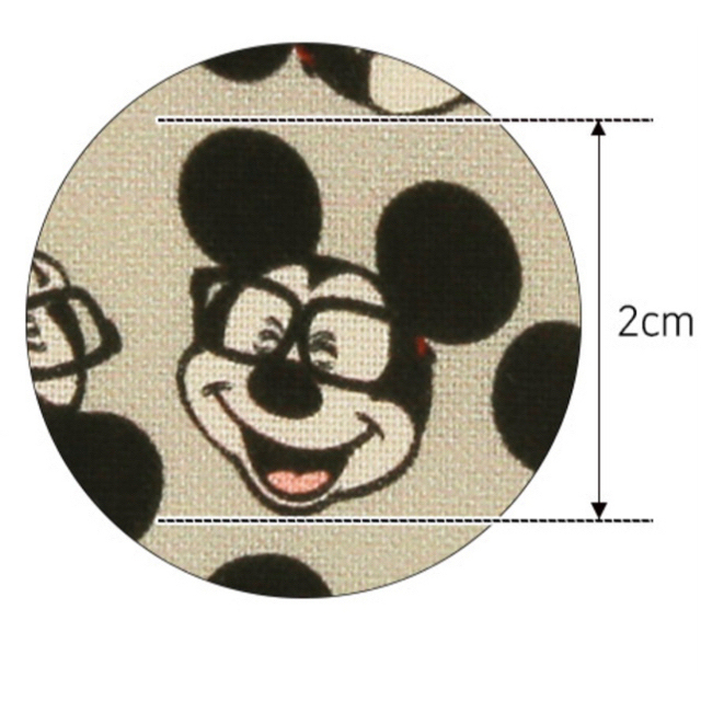 Disney(ディズニー)の新品🐭輸入生地　ミッキー　フェイス総柄45cm BAIGE綿100 ハンドメイドの素材/材料(生地/糸)の商品写真