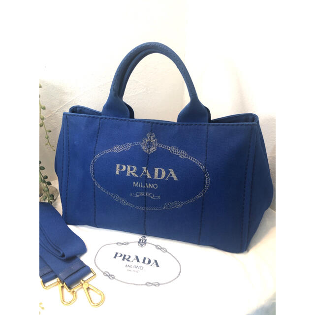 ホワイト PRADA カナパの通販 by みみ's shop|プラダならラクマ ...