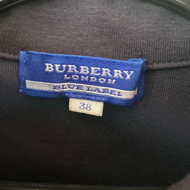 BURBERRY BLUE LABEL(バーバリーブルーレーベル)のバーバリーブルーレーベル　パフスリーブ　リボン付き　ポロシャツ　ホースマーク レディースのトップス(ポロシャツ)の商品写真