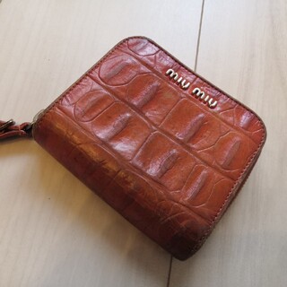 ミュウミュウ(miumiu)のmiu miu 二つ折り財布 正規品 オレンジ型押しレザー(財布)
