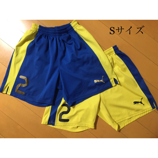 PUMA(プーマ)のPUMA ユニフォームパンツ　青、黄色　2枚（サイズ:S） スポーツ/アウトドアのサッカー/フットサル(ウェア)の商品写真