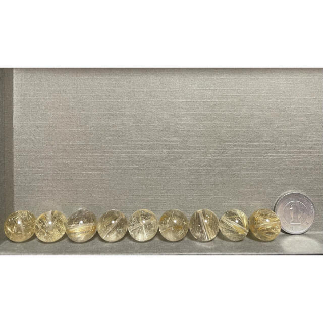ゴールドルチルクォーツ　9粒セット ハンドメイドの素材/材料(各種パーツ)の商品写真