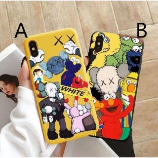 アイフォーン(iPhone)のKaws×セサミストリート イエロー iphoneケース　各種サイズ(iPhoneケース)