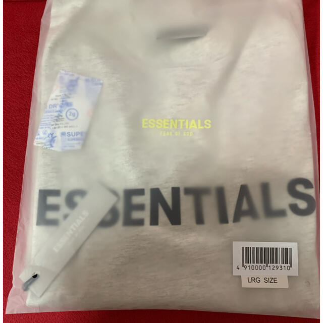 FEAR OF GOD(フィアオブゴッド)のESSENTIALS エッセンシャルズロンT OATMEAL  メンズのトップス(Tシャツ/カットソー(七分/長袖))の商品写真