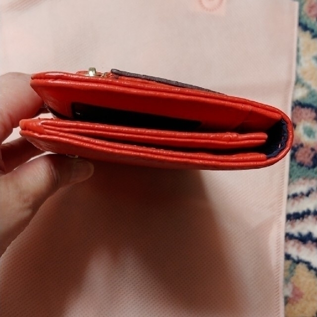 Cole Haan(コールハーン)の未使用に近いコールハーン　オレンジ長財布 レディースのファッション小物(財布)の商品写真