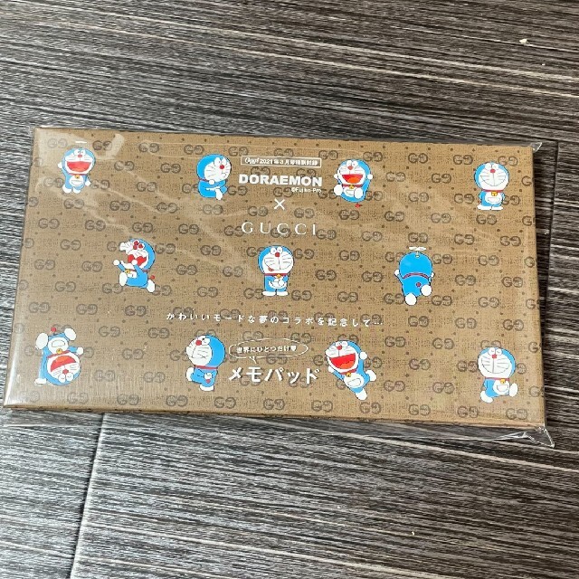 Gucci(グッチ)のGUCCI ドラえもん メモパッド エンタメ/ホビーのおもちゃ/ぬいぐるみ(キャラクターグッズ)の商品写真