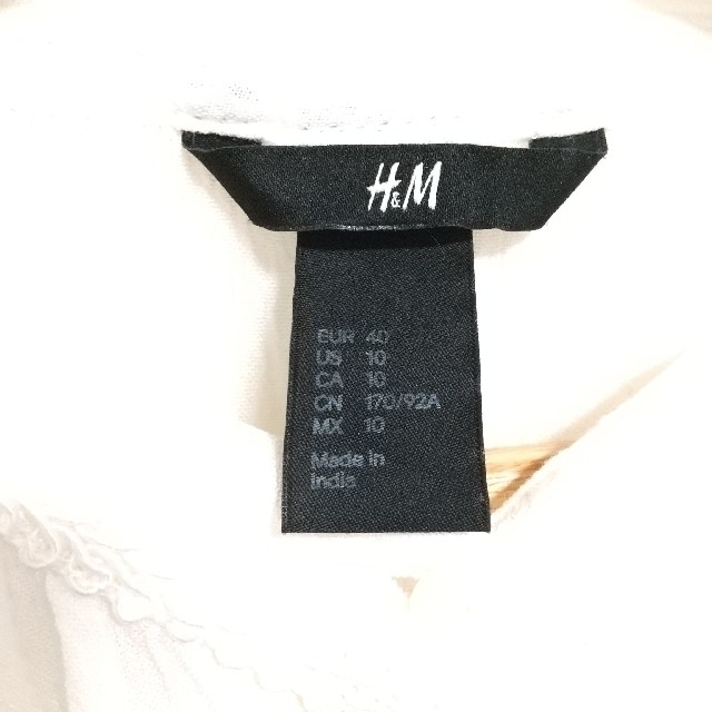 H&M(エイチアンドエム)の【訳あり】 H&M  ブラウス  長袖 刺繍  フリンジ  オフホワイト 白 レディースのトップス(シャツ/ブラウス(長袖/七分))の商品写真