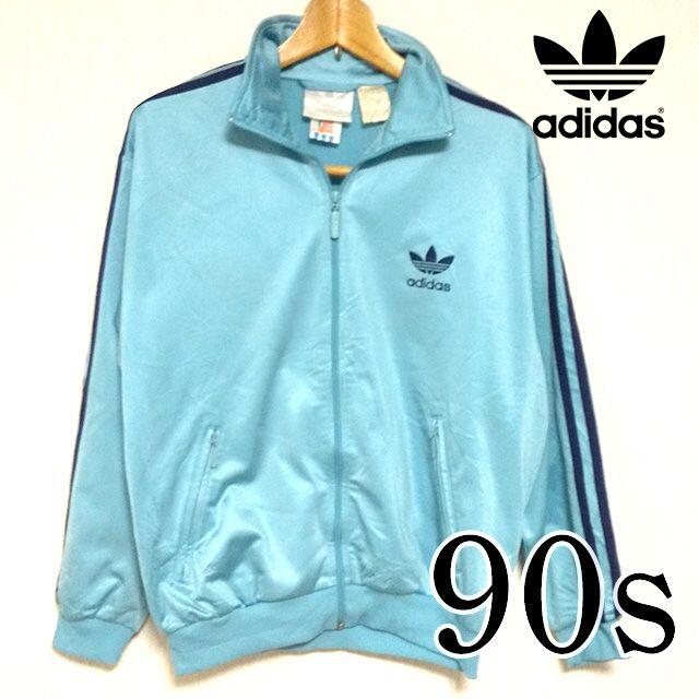 adidas(アディダス)のアディダスオリジナルス　ジャージ　Lスカイブルー　90s　万国旗タグ レディースのジャケット/アウター(ナイロンジャケット)の商品写真