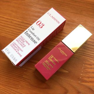 クラランス(CLARINS)のクラランス コンフォート リップオイル  03 インテンス ラズベリー(リップグロス)