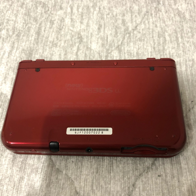 任天堂(ニンテンドウ)のNewニンテンドー3DS LL メタリックレッド エンタメ/ホビーのゲームソフト/ゲーム機本体(携帯用ゲーム機本体)の商品写真