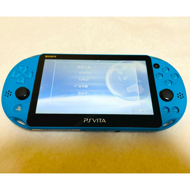 PlayStation Vita(プレイステーションヴィータ)のPSVita PCH-2000 ZA23 アクアブルー 画面傷無し エンタメ/ホビーのゲームソフト/ゲーム機本体(家庭用ゲーム機本体)の商品写真