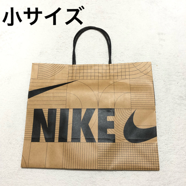 NIKE(ナイキ)の小サイズ 紙袋　NIKE ナイキ ショッパー　ナイキ紙袋　プレゼント梱包資材 レディースのバッグ(ショップ袋)の商品写真