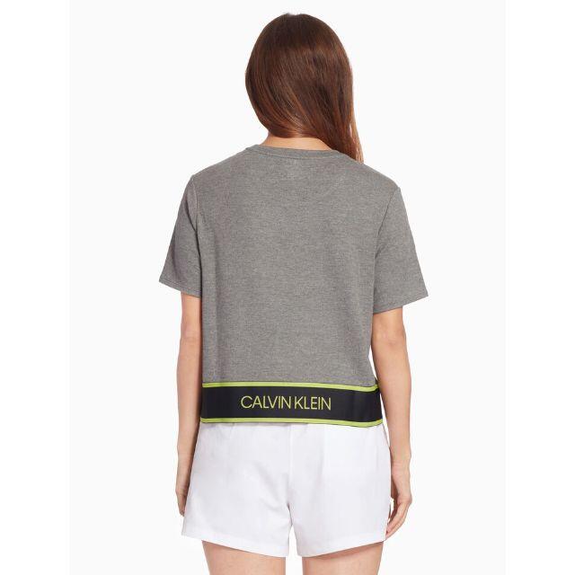 Calvin Klein(カルバンクライン)のカルバンクライン アクティブ アイコン ロゴ ヘム Tシャツ カットソー グレー レディースのトップス(Tシャツ(半袖/袖なし))の商品写真